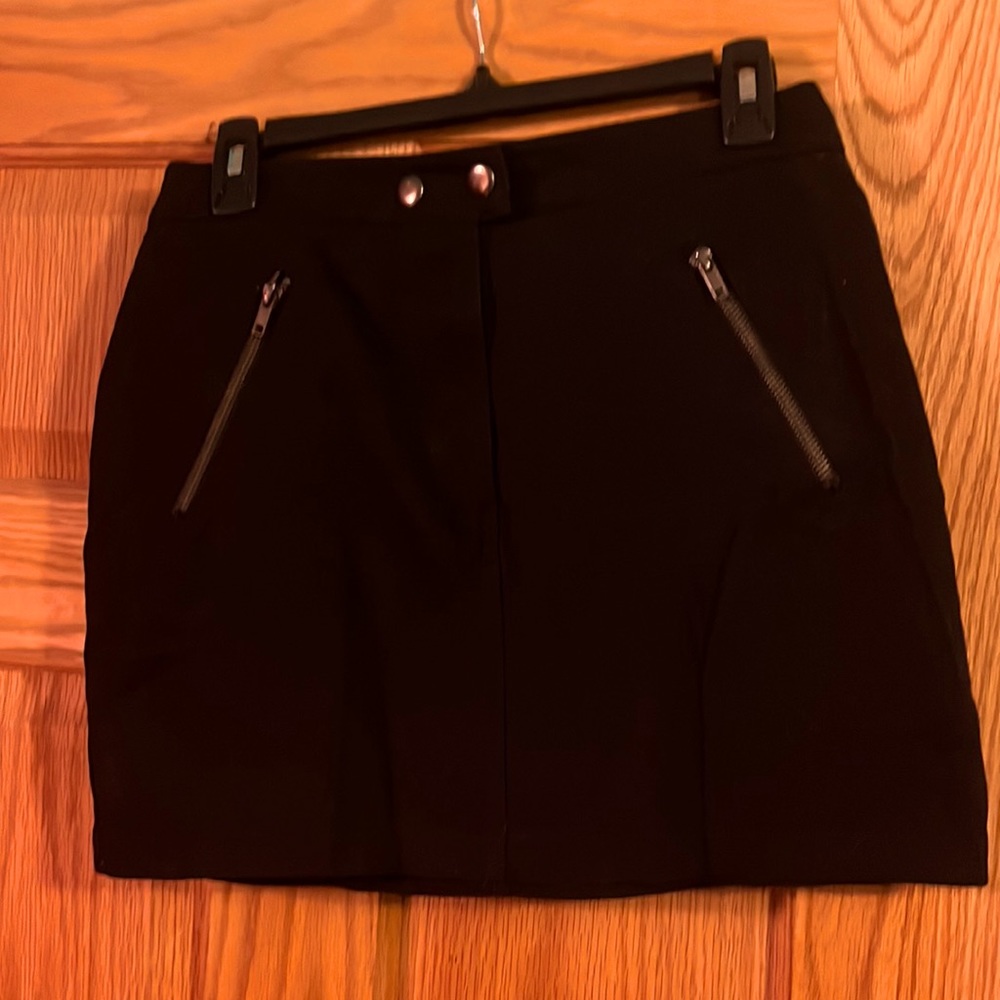 Black mini skirt with zippers